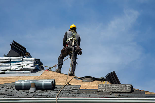Professional Roof Replacement technician working in Redgranite, WI